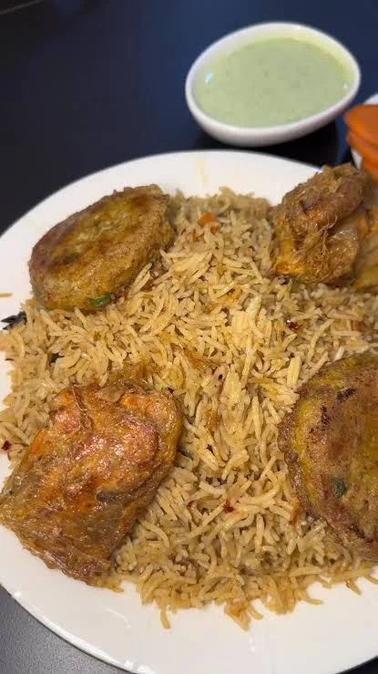 Pulao and kababs served with raita